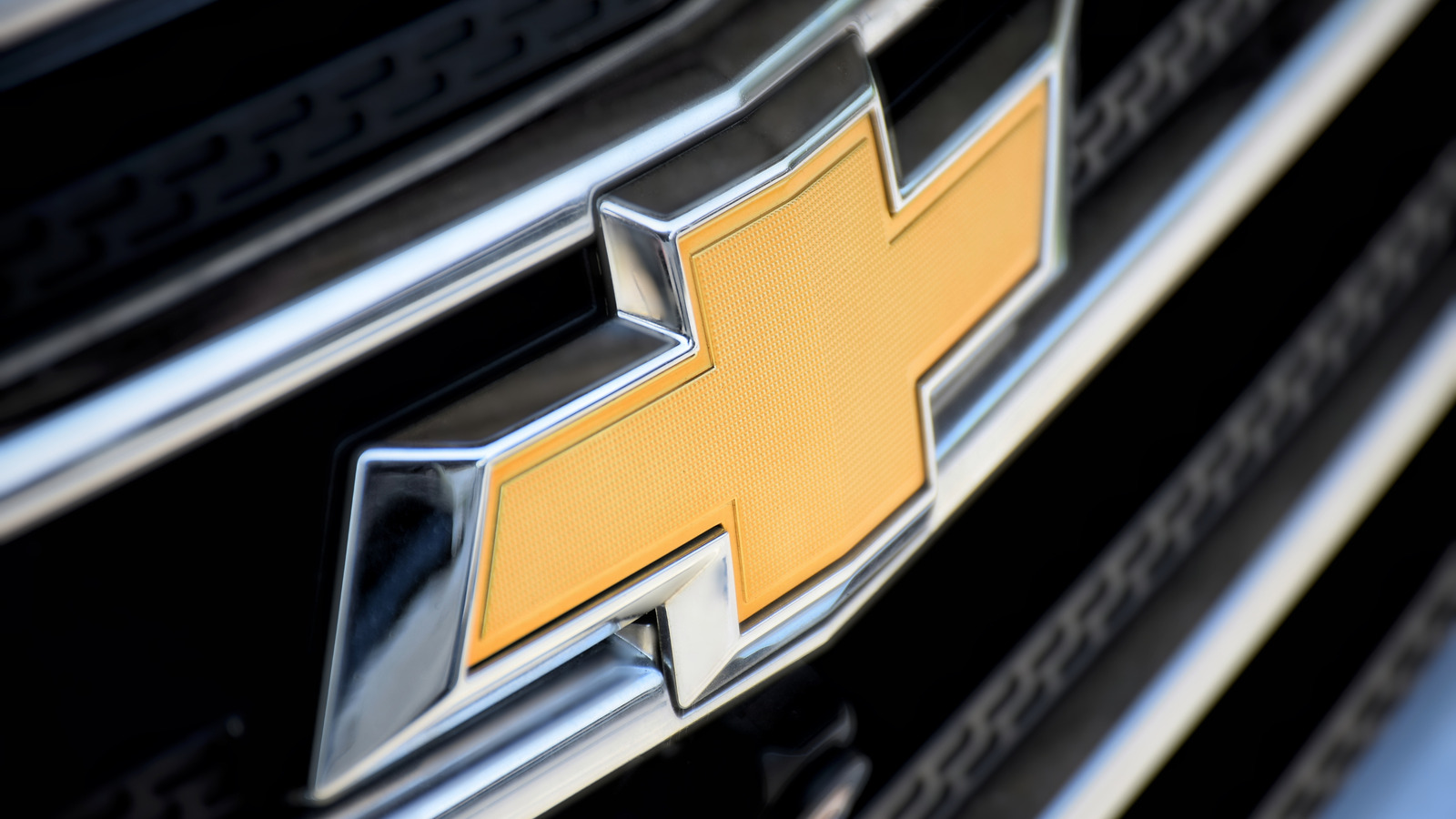 Why Enact Some Holden Commodores Dangle Chevy Bowtie Badges?